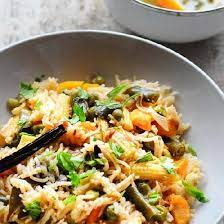 A One Pot Vegetarian Rice Meal With Lots Of Vegetables If You Have A Rice Cooker Or Pressure Cooke Veg Pulao Recipe Vegetable Pulao Recipe Indian Food Recipes