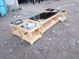Coffee table and 2 end tables, each has a slide out shelf to extend surface area. Coffee Tables Nairobi Kenya Furniture Natafuta