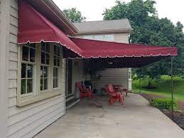 Stay Cool And Dry With A Stationary Canopy Covering Your Patio Area Add Matching Window Awnings To Lower In Patio Canopy Privacy Screen Outdoor Canopy Outdoor