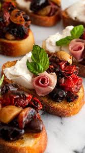 Here are a few tips…it's easier than you think and can be very impressive with the right menu. Bruschetta With Seared Tomatoes Roasted Garlic Burrata Italian Dinner Party Food Elegant Appetizers