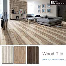 Large floor tiles that look like wood. New Style Large Format Porcelain Brown Color Ceramic Tile Rustic Ivory Wooden Flooring Tiles Buy New Model Flooring Tiles Wooden Floor Tiles Ceramic Tile Rustic Ivory Wooden Flooring Tiles Product On Alibaba Com