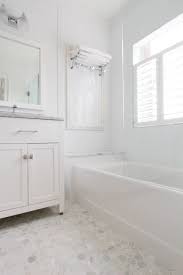 A classic clawfoot tub and simple pedestal sink are contrasted by extravagant brass light fixtures. 75 Beautiful Small Traditional Bathroom Design Ideas Pictures Houzz