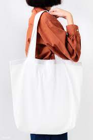 Download Premium Png Of Woman With A Tote Bag Transparent Png 2291613 Yellow Tote Bag Tote Bag Bags