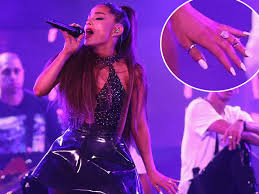 You know, the one that cost $100k? Ariana Grande Has Replaced Her Engagement Ring With A Friendship Ring