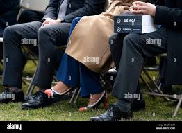 In this Wednesday, Jan. 29, 2020 photo, Al Rehder, left, talks with Larry  Koland in Rehder's car condo at the Eagan Car Club in Eagan, Minn. Behind  Rehder's 1939 Ford is a