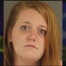 Woman accused of helping inmates