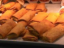 What Would Be Considered American Food Man Cooking Food Burritos