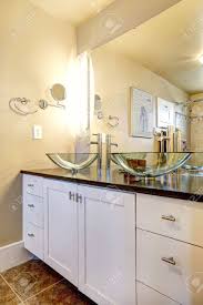 Check spelling or type a new query. White Bathroom Vanity Cabinet With Glass Vessel Sinks And Mirror Stock Photo Picture And Royalty Free Image Image 31606288