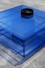 This coffee table has a sturdy top, on which you can place drinks, vases, fruit bowls, or ornaments. Blue Glass Clear Transition Color Coffee Table By Studio Buzao Customizable Coffee Table Blue Glass Coffee Table Design