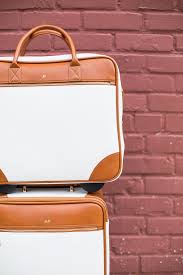 To the right of the dials is a small flush silver button. Mark Graham Full Travel Bag Review Haute Off The Rack