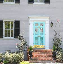 Front door colors vary depending on the style of house, color of the exterior and area of the country where you live. Outdoor Living Decorating And Party Ideas Laura Trevey Lifestyle Front Door Colors Door Color Aqua Front Doors