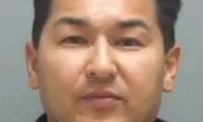 Bomb-strapped man shot dead by police after threatening to blow himself up  at train station