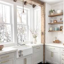 Gray kitchen cabinets with brass hardware. Sherwin Williams Repose Gray Paint Life On Summerhill