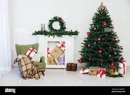 White House 2022 Red Christmas Trees Christmas Tree With Gifts By The Fireplace For The New Year Decor Of The  House 2021 2022 Stock Photo - Alamy