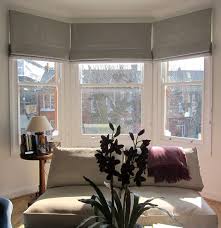 Geometric Patterned Roman Blinds In A Bay Window Is Creative Inspiration For Us Get Mor Roman Blinds Living Room Bay Window Living Room Bay Window Treatments
