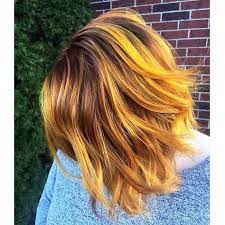 Pros Say Grown Out Roots Is A Huge Hair Color Trend For Spring New Hair Color Trends Hair Styles Yellow Hair Color