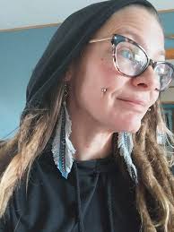 Loving these denim.feather earrings!!