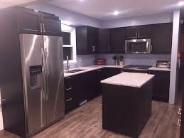 Diy Ikea Kitchen With Laxarby Cabinets Quartz Countertops In Atlantic Salt Whirlpool Appliances And Pergo Grey Oak Laminate Flooring From Home Depot B Casas