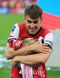 Aaron ramsey of arsenal shows off his tattoo on his left. Arsenal Star Aaron Ramsey Meets Sydney Superfan Daily Mail Online