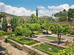 Bespoke wooden benches and chairs give visitors a place to pause, reflect and soak up the atmosphere and sensational planting. Islamic Garden Design Earthly Paradise Saga