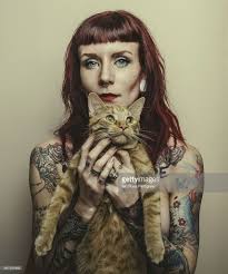 Red Haired Model With Lots Of Tattoos Holding A Tabby Cat Woman And Pinup Photoshoot Cat Photography Tabby Cat