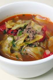 Stuffed Cabbage Stoup Recipe With White Rice Ground Beef Onion Garlic Carrot Cabbage And Tomatoes Ready In Food Network Recipes White Rice Recipes Food
