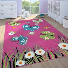 Mat in der form eines schmetterlings. Kinderteppich Schmetterlinge Blumen Pink Teppichcenter24