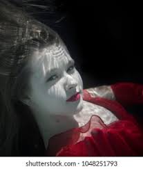 Maddison Powell Underwater Red Dress Stock Photo 1048251793