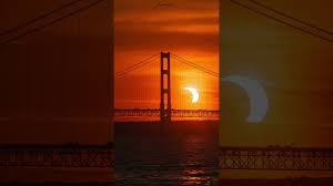 The beautiful mackinac bridge that traverses the straits of mackinac and connects the upper and lower peninsulas of michigan is one of the best places in the state to make a perfect northern lights photo. Annular Solar Eclipse Over The Mackinac Bridge Short Youtube