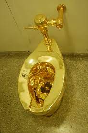 Fancy gold border painted on a kohler devonshire. America Cattelan Wikipedia
