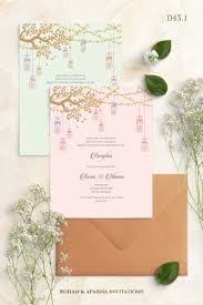 Modern Style Wedding Invitation Concept With Lanterns Hanging From A Tree For M In 2020 Indian Wedding Invitation Cards Wedding Card Design Indian Unique Wedding Cards
