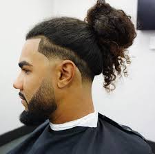 Settle for a high skin fade that disconnects the hair from the beard. 59 Sexy Man Bun Hairstyles You Need To Try Immediately