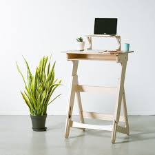 This stylish standing desk lifts up when you need it, then folds back down to a regular size when if you've already invested in a cute desk, but still want to enjoy the health benefits of standing for a few. New Wooden Standing Desk Is Scandinavian Inspired And Totally Cute Curbed