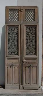 Grande Double Porte Ancienne A Decor De Ferronnerie Portes Door Glass Design Patio Door Coverings Traditional Front Doors