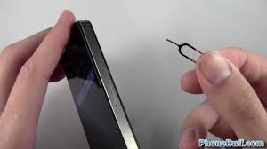 Utilize the sim eject tool (or paperclip) to unlock the tray by inserting it into the slot. How To Open The Sim Card Door On The Iphone Youtube