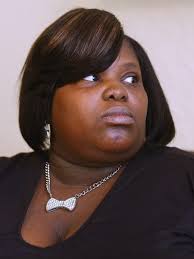 Ayouna McClinton and lawyer give news conference