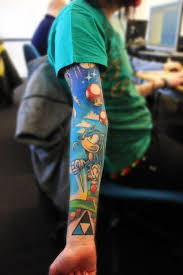 One impressive video game tattoo. Pin By Alice Wang On Tattoo Gaming Tattoo Gamer Tattoos Geek Tattoo