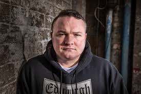 Crime lord's son flees abroad after bungling hitman's gun jams during  doorstep assassination bid dressed as postie