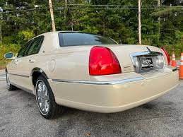 Image result for Light Parchment Gold 1999 Town Car