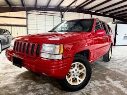Image result for Flame Red 1997 Jeep