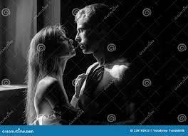 Romantic Couple in Love Looking at Each Other, Embracing and Kissing in  Bedroom on Black Background. Stock Image - Image of intimate, beauty:  239765933