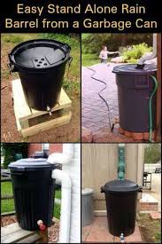 Easy Stand Alone Rain Barrel From A Garbage Can Rain Barrel Rain Barrels Diy Rain Barrel System