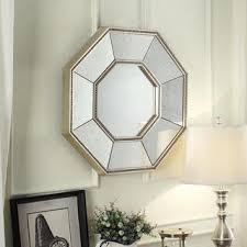 Goodbye to our old burnt orange colors and hello to calming blues, greens, gold and whites. Inspire Q Beaded Trim Octagon Gold Accent Wall Mirror