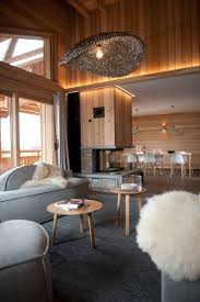 Cheminee Bois Meleze Et Pierre Luzerne Appartement En Suisse Chalets Bayrou Maison Ossature Bois Decoration Interieure Chalet Maison