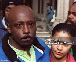 Two members of the family of Christopher Alder, who died in police... News  Photo