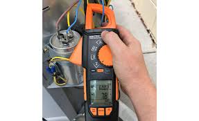 One of the other technicians condemned the compressor, but other than the high amp draw the compressor would not indicate any problems. Testing The Run Capacitor While The System Is Running 2017 06 12 Achrnews