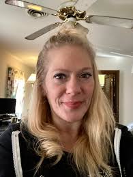 Hello. My Sister passed away suddenly last week. This is one of her last  photos and I was wondering if anyone could make the background nicer, maybe  with flowers. Thank you very