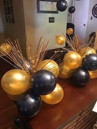 120 Diy New Years Eve Party Decorations That Ll Earn You Brownie Points Balloon Table Decorations Balloon Table Centerpieces 50th Birthday Party Decorations