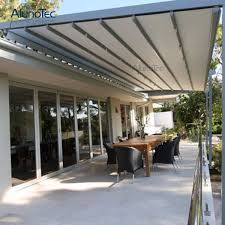 Interchangeable with our awning screen enclosures, clear vinyl plastic awning panels will winterize your awning from cold, rain & snow. China Hot Sale Remote Controlled Awning Retracted Pergola With Side Sun Screen China Retracted Pergola And Retractable Awning Price