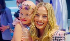 Margot Robbie: Barbie star visits kids at Sydney Children's hospital and  meets four-year-old fan